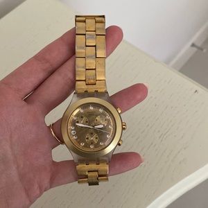 Gold swatch watch